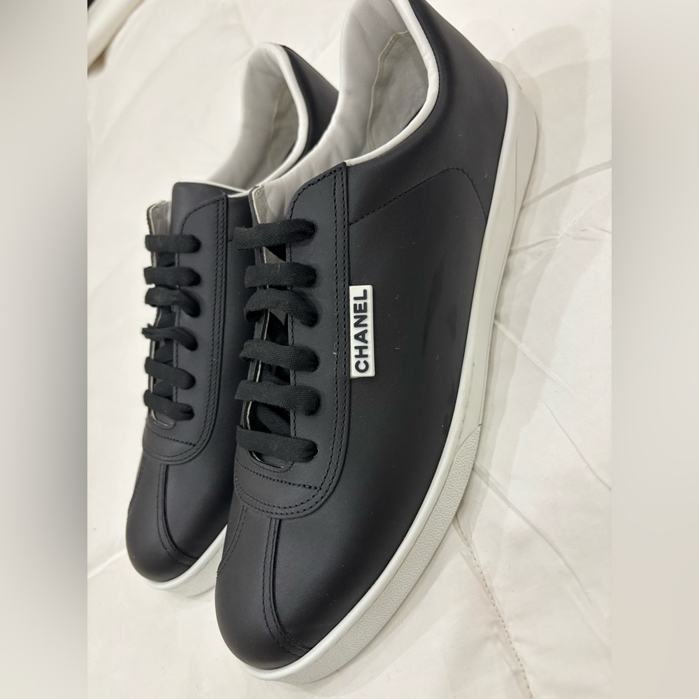 CHANEL Men's Sneakers in Black with White Soles